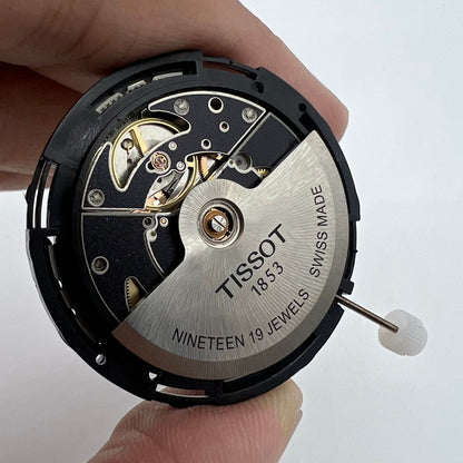 ETA C15.111 chronograph mechanical watch movement with white dial by Tissot, Swiss made precision.