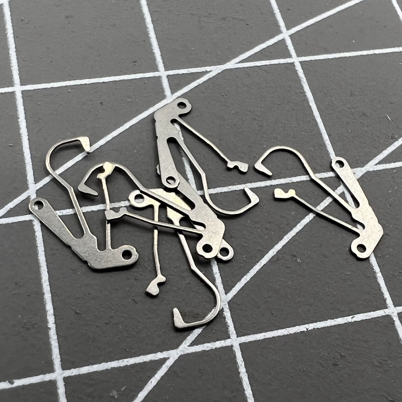 Corrector spring replacement part for Miyota 8200 movement, precise watch repair accessory.