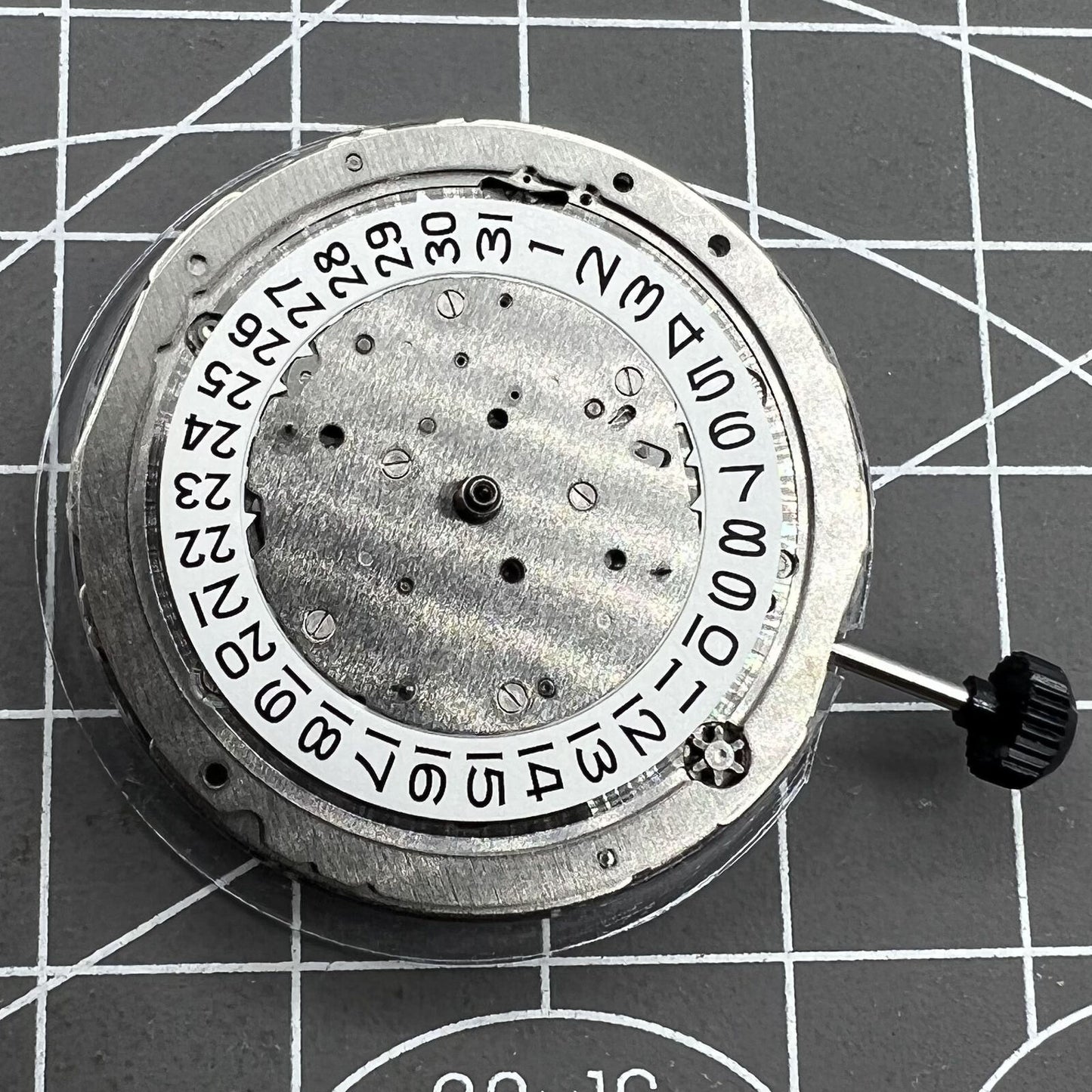 Miyota 9120 automatic watch movement showing date display at 4:30 for precise timekeeping.