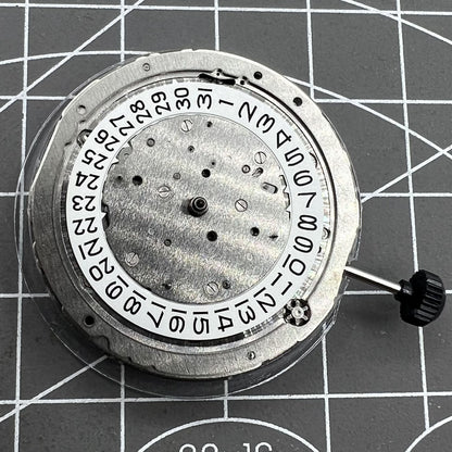 Miyota 9120 automatic watch movement showing date display at 4:30 for precise timekeeping.