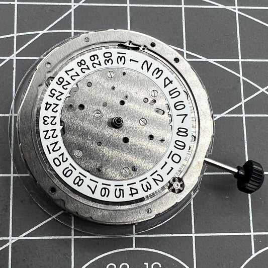 Miyota 9120 automatic watch movement showing date display at 4:30 for precise timekeeping.