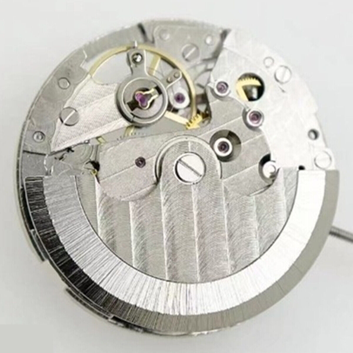 Hollow 8205 automatic watch movement with moon phase by China, precise mechanical timekeeping component.