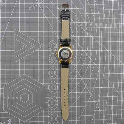 Beijing Double Rhomb watch with golden case, silver nail markers, manual mechanical movement, classic style timepiece.
