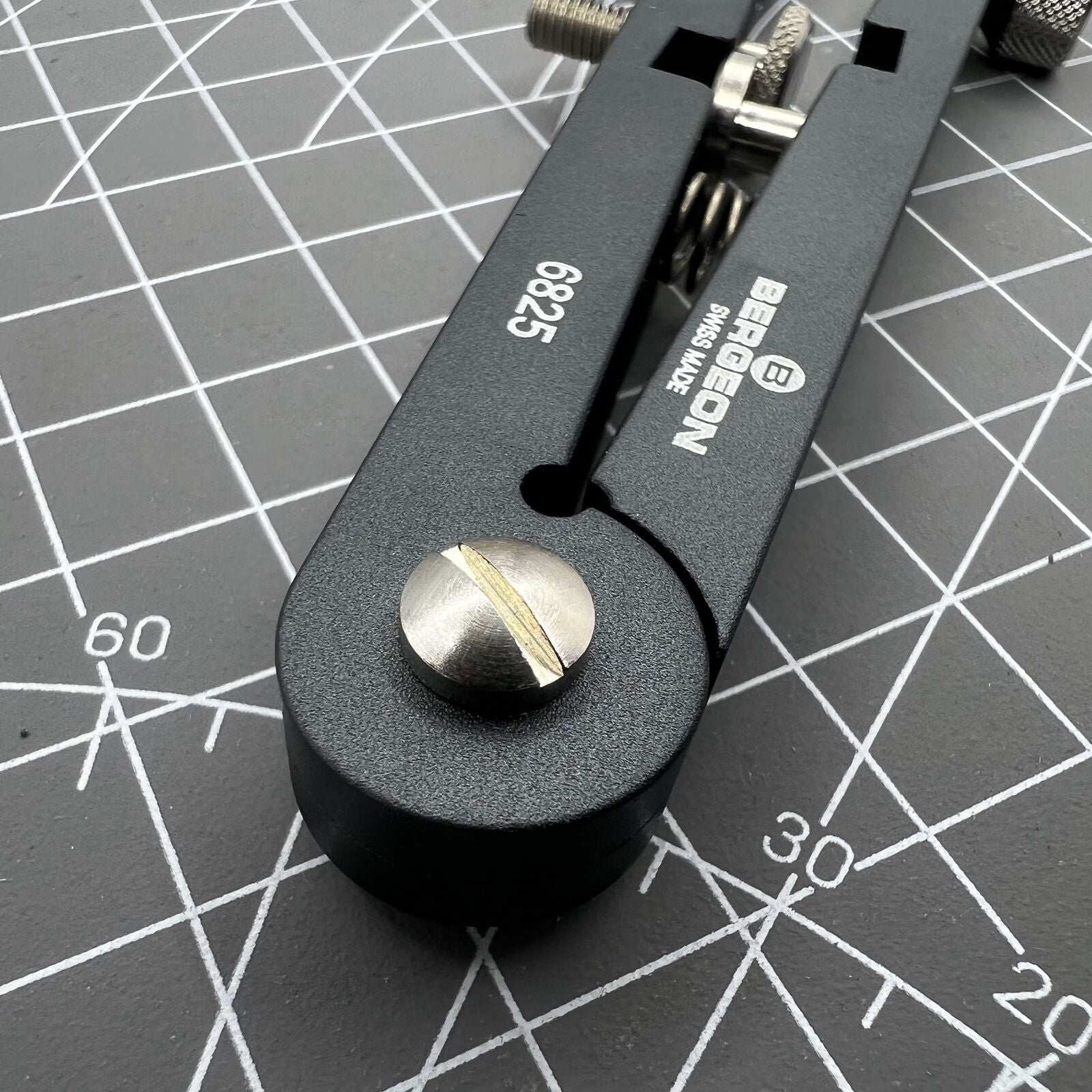 Bergeon 6825-PF spring bar pliers for precise Swiss watch bracelet removal and adjustment.