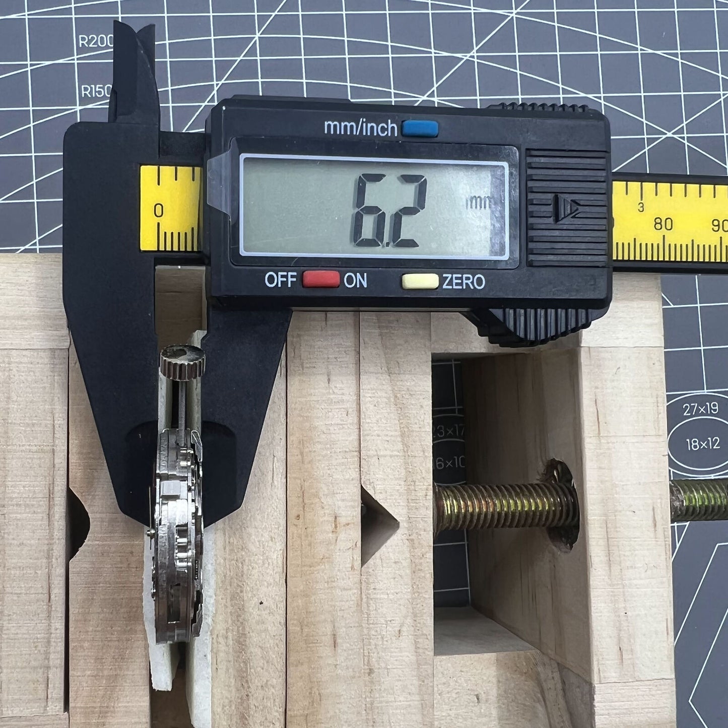 Dandong Silver hollow balance wheel watch movement displaying automatic mechanical precision and craftsmanship.