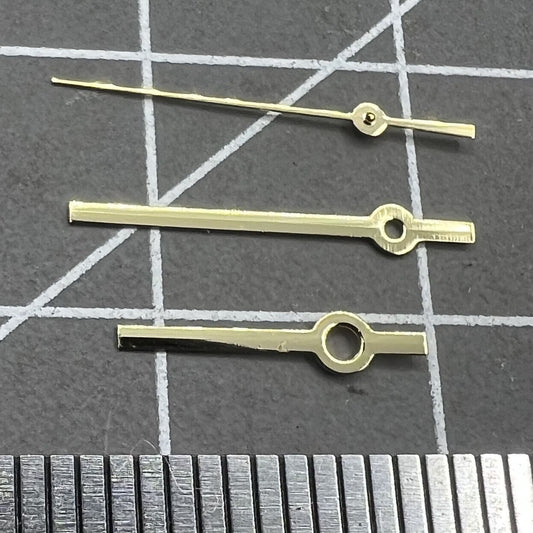 Golden polished 12mm watch hands set for Ronda 515 quartz, sleek design for stylish timepieces