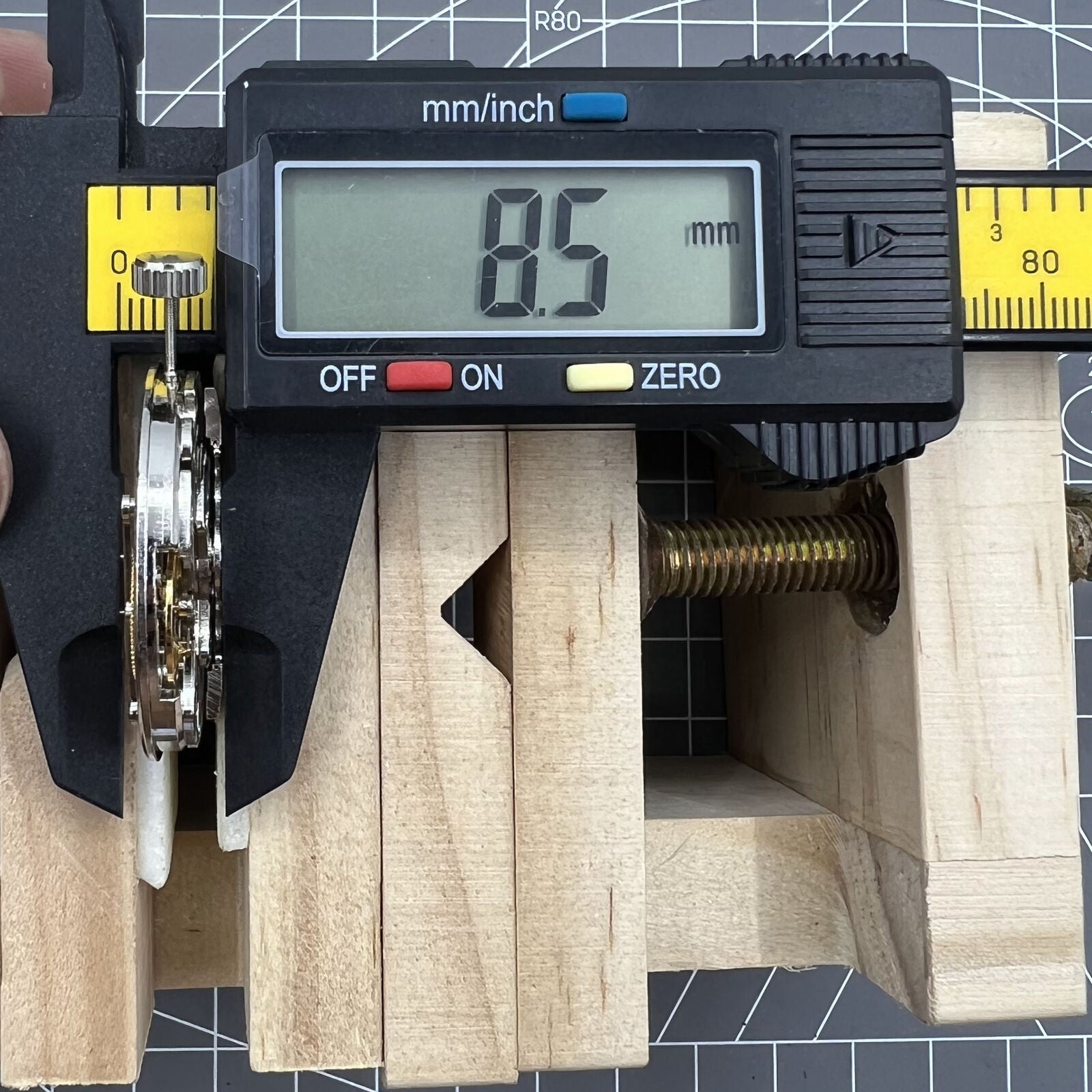 Double Mainspring hollow mechanical watch accessory with multi-function and dual time zone design for precision timekeeping.