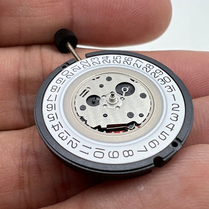 Swiss Made ETA 805.112 quartz watch movement with 3 hands and date display at 3 o'clock.