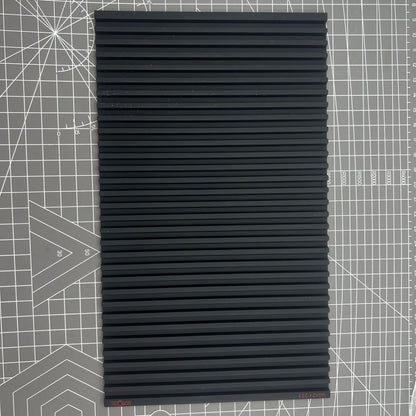 Swiss Horotec MSA24.223 black silicon bench mat with 32 grooves for secure watch accessory handling