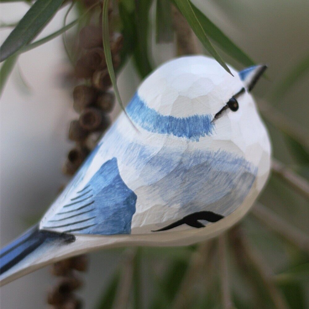 Handmade Blue Tit wooden figurine, detailed bird sculpture for unique home decor and collectibles.