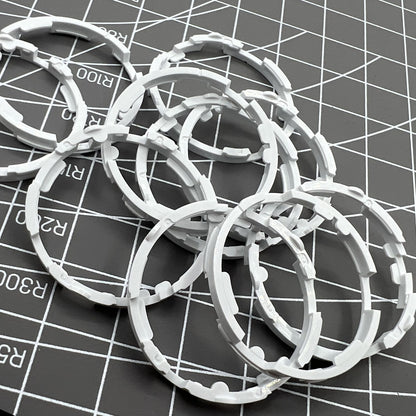 Set of 5 Miyota 8200 series movement cushion spacer rings for precise watch assembly.