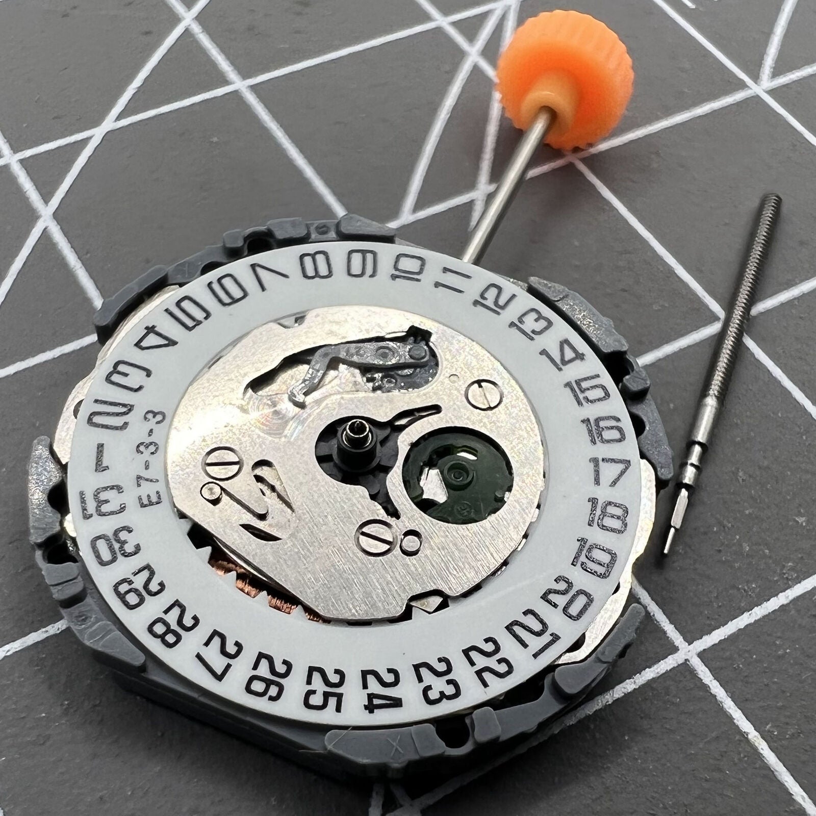 Japan Made Miyota 1N12 quartz watch movement with date display at 3 o'clock, reliable replacement by Miyota.