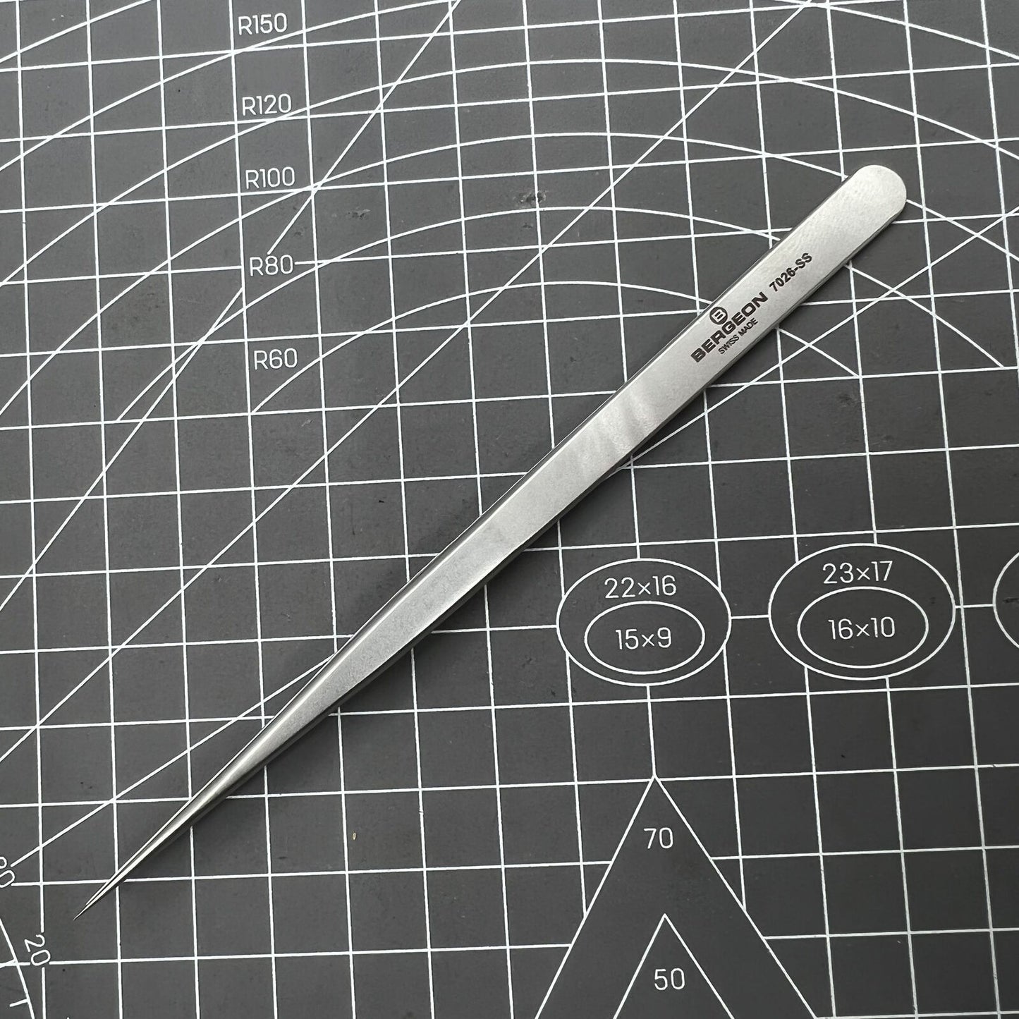Swiss Bergeon 7026-SS antimagnetic tweezer with narrow, fine points for precise watch repair tasks.