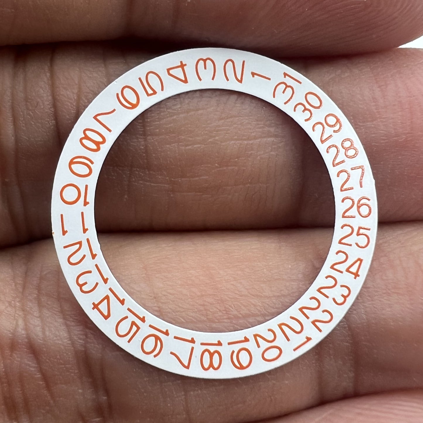 Orange date disk wheel for Miyota NH35 NH36 watch movement, date displayed at 3 o'clock, white background.