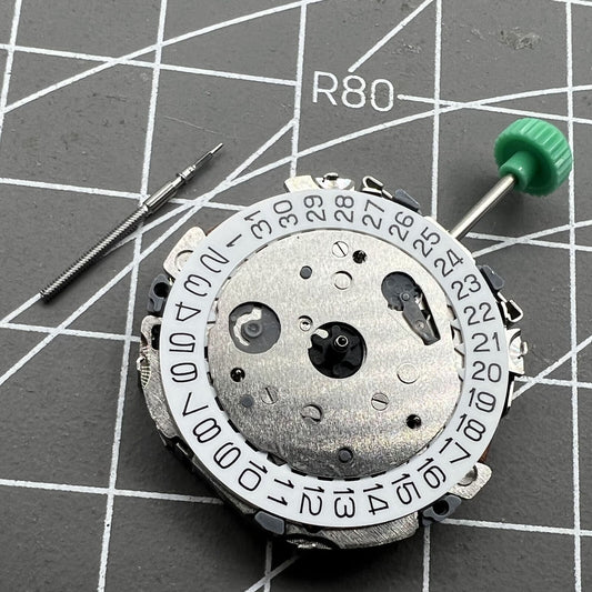 Miyota FS01 quartz chronograph watch movement with 3 eyes and date at 4 o'clock.