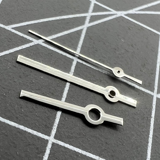 Silver watch hands set for Miyota 2035 quartz, sleek design by P1-H2-C18 ensures precise timekeeping.