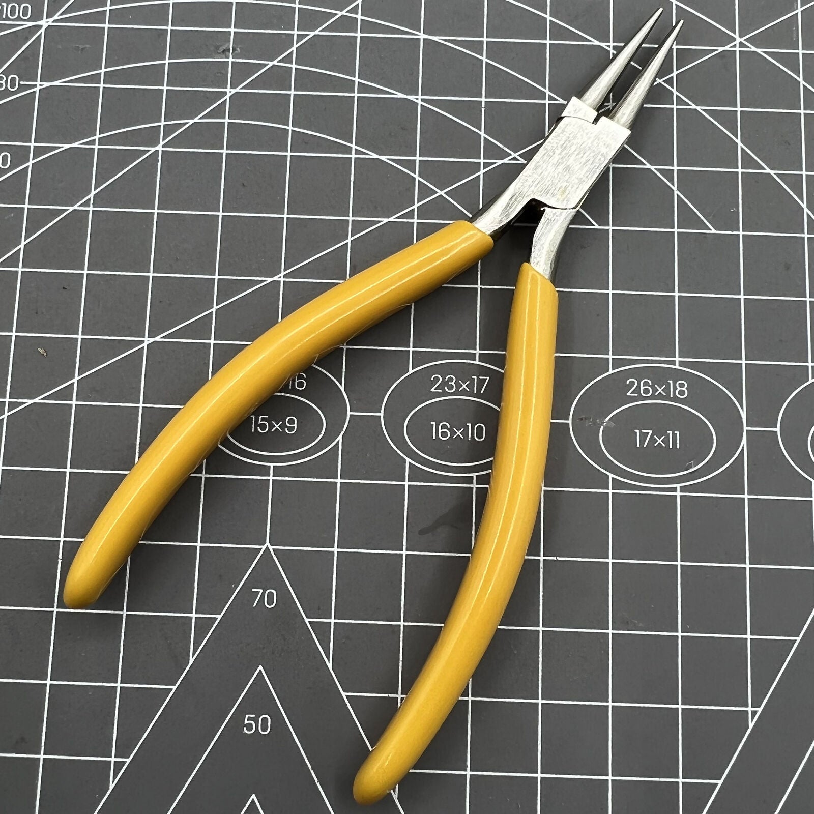 Swiss Bergeon 2512 smooth jaw round nose pliers for precise watch accessory repairs and adjustments.