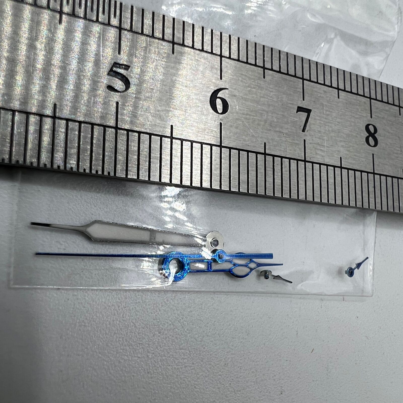 Blue-trimmed green lume watch hands by Miyota for OS10 0S10, enhancing visibility and style.