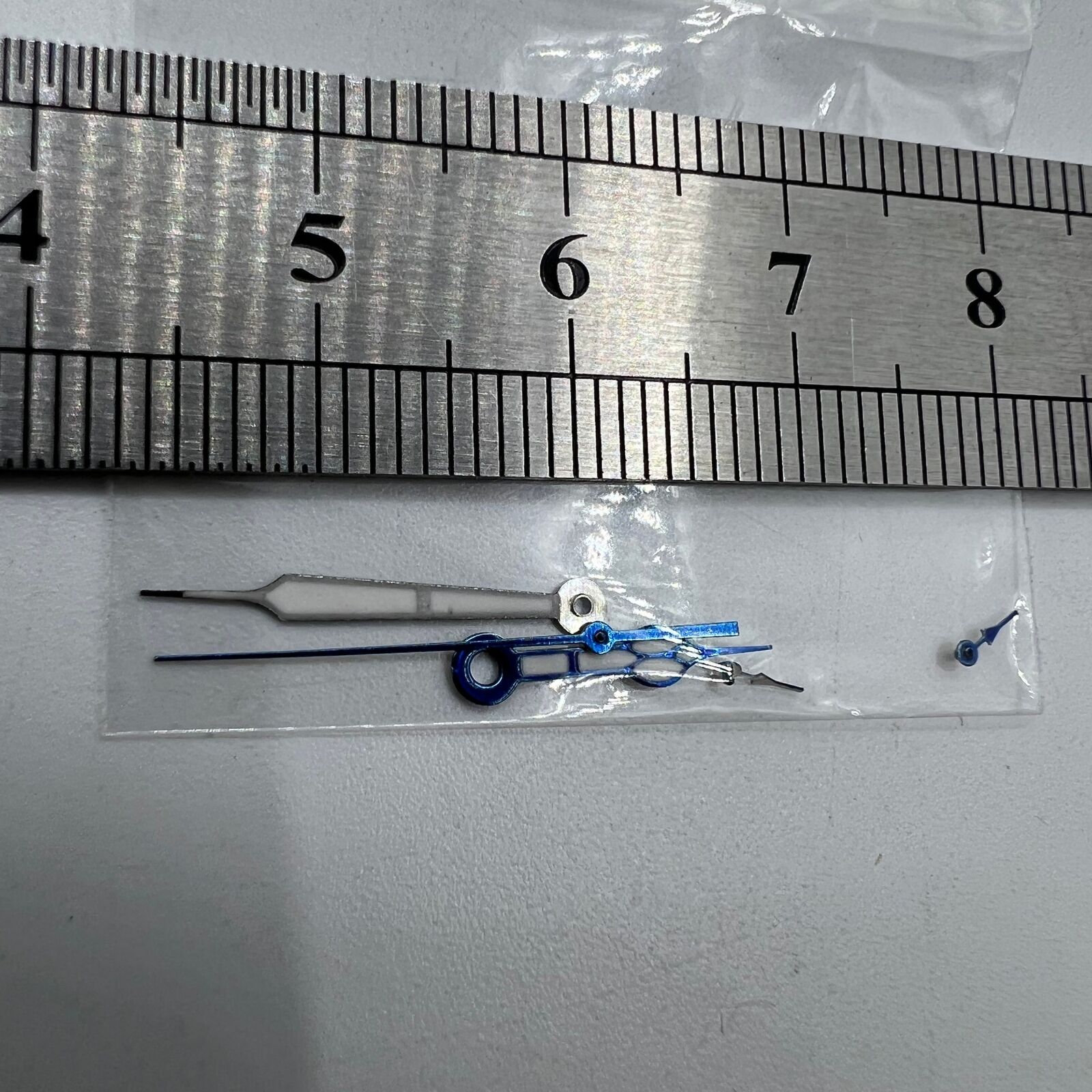 Miyota OS10 green lume watch hands with blue trim, designed for precise fit and improved visibility.