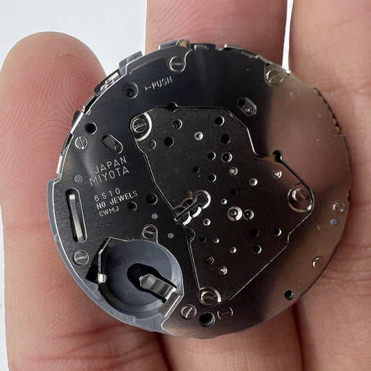 Miyota 6S10 Quartz watch movement with date at 3, 3 hands, small seconds at 6, 9, and 12 positions.