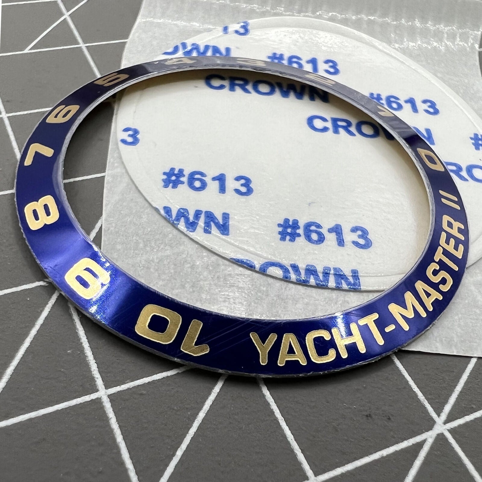 Golden silver aluminium alloy watch bezel insert with numerals for Yacht-Master 2, perfect for stylish upgrades.