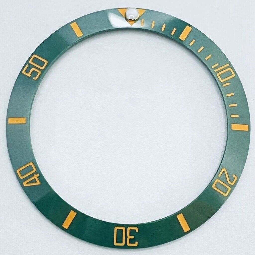 38mm green GMT ceramic bezel with golden font, compatible with 40mm watch cases, enhancing style and functionality.