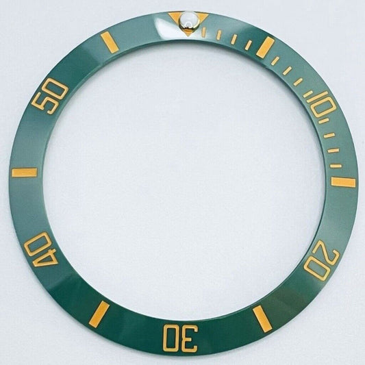 38mm green GMT ceramic bezel with golden font, compatible with 40mm watch cases, enhancing style and functionality.