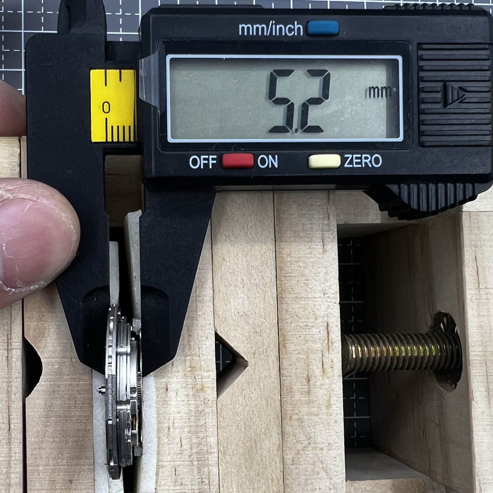 Miyota 9110 automatic watch movement with date feature at 3 o'clock, precise mechanical craftsmanship.