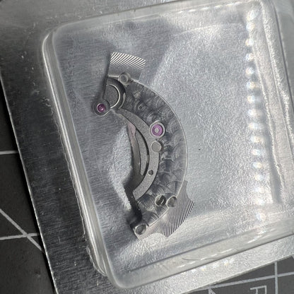 Silver upper bridge splint for ETA2892A2 watch movement, durable replacement part for precise repairs.