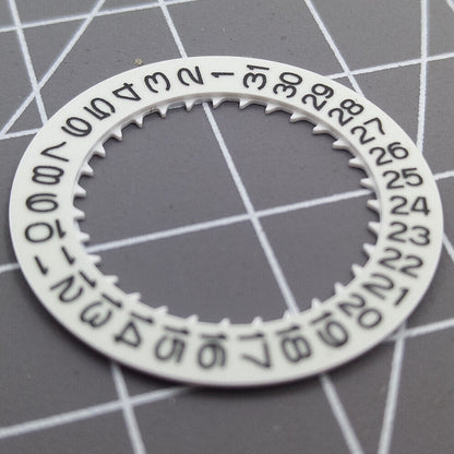 Luminous date disk wheel for NH35 movement with date display at 3 o'clock, precision fit.
