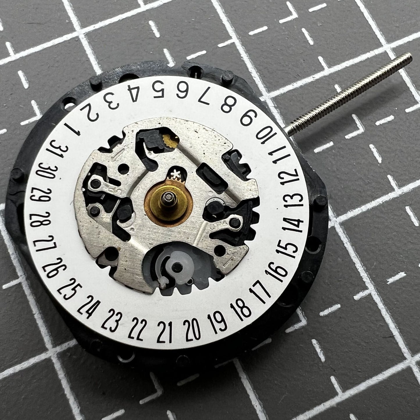 Hattori Epson VX19E quartz movement with date display at 6 o'clock for watch accessories.
