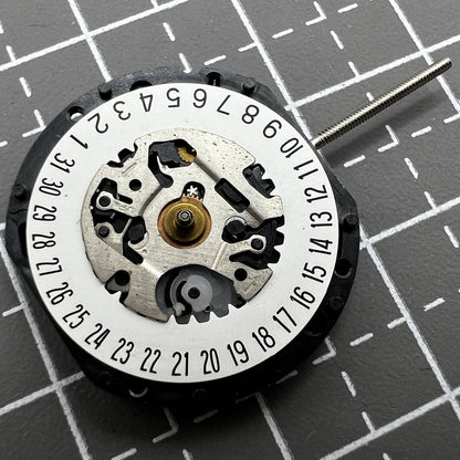 Hattori Epson VX19E quartz movement with date display at 6 o'clock for watch accessories.