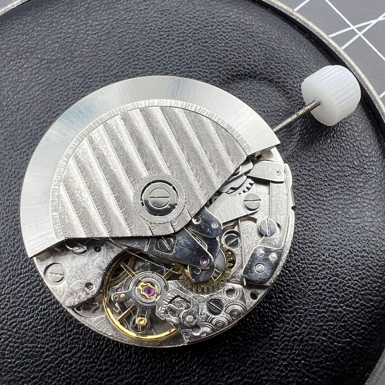 7750 Automatic mechanical watch with small seconds at 12, precise timekeeping.