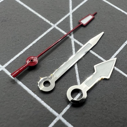 Silver arrow-shaped watch hands with red second hand and green lume, compatible with NH35 NH36.