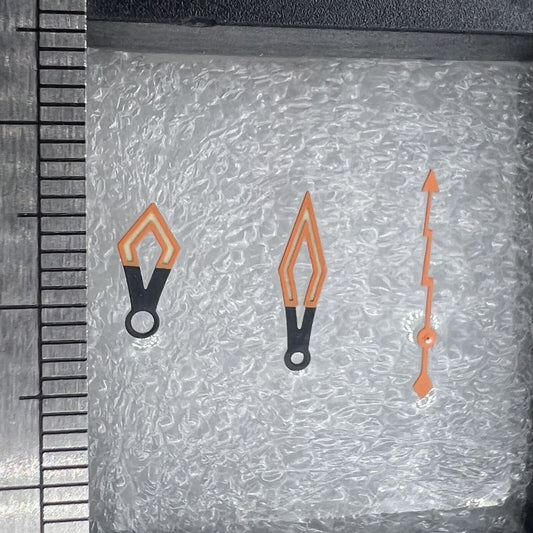 Watch hand set with butterfly design, black and orange trim, C3 green lume for NH35/36/4R movement, brand specified.