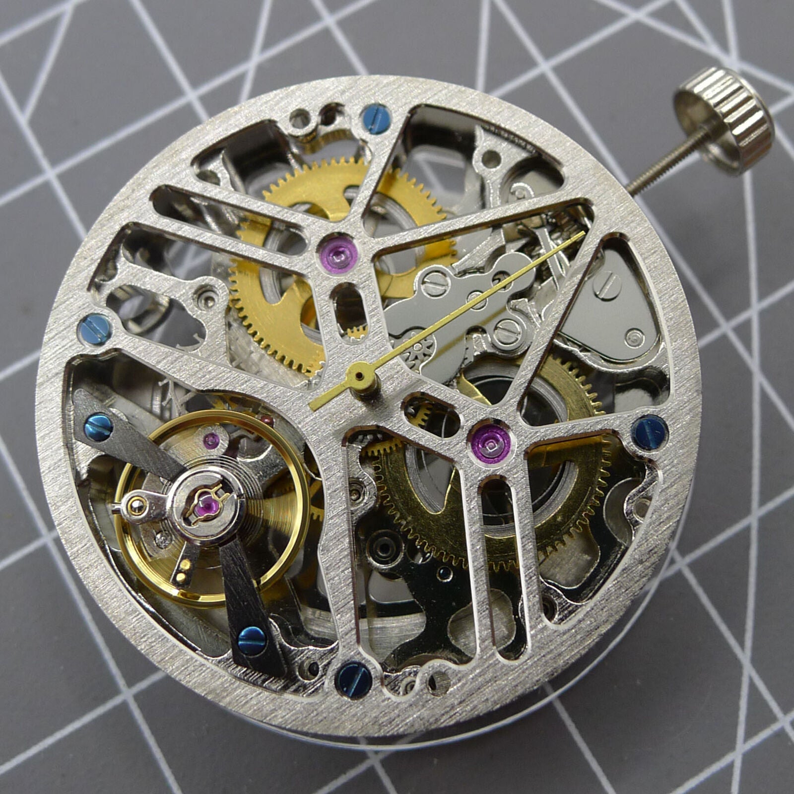 SL1911 Silver hollow balance wheel watch accessory showcasing automatic mechanical movement.