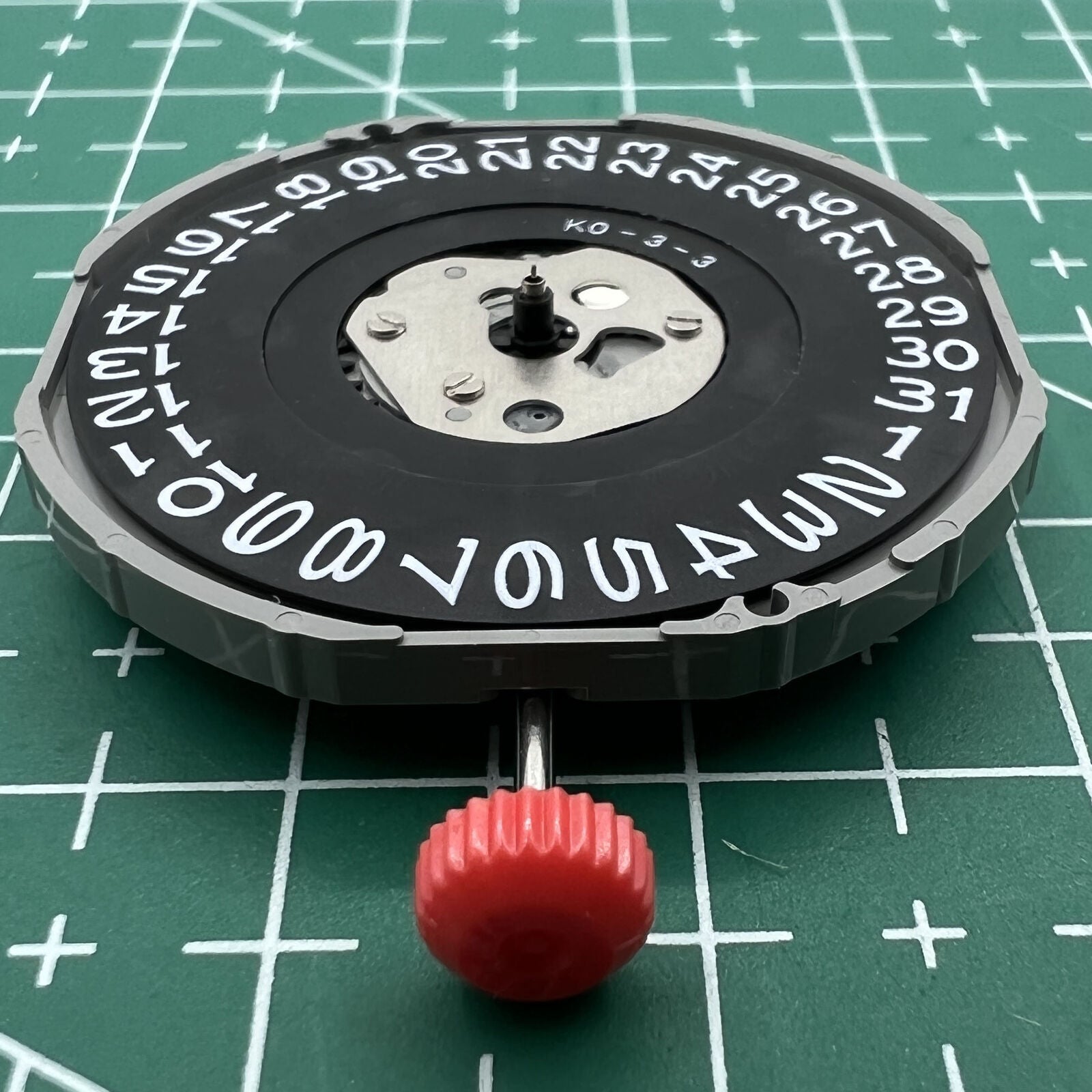 Miyota 2415 quartz movement with black date disk at 3 o'clock, Japan-made watch accessory.