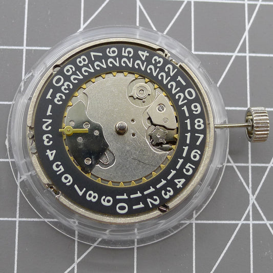 Black Seagull ST2555 automatic watch movement with second hand at 9H, perlage finish, and big date display.