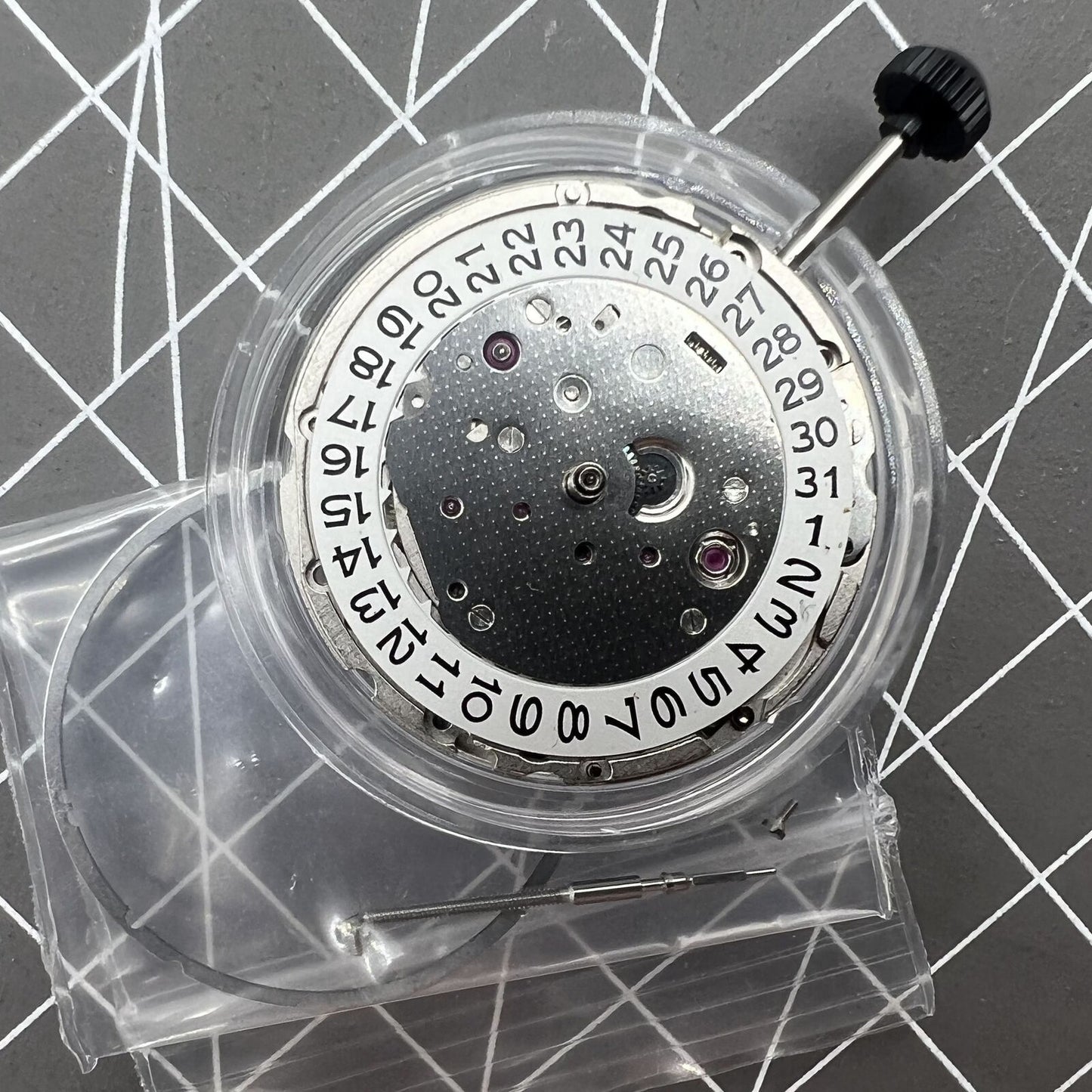 Miyota Citizen 9010 automatic watch movement showing date display at 3 o'clock, ultra-thin design