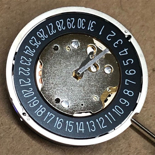 Ronda 5021D Swiss quartz watch movement with black finish and date display at 6 o'clock.