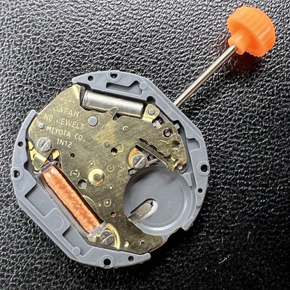 Miyota 1N12 quartz watch movement with date at 3 o'clock, Japan-made reliable replacement part.