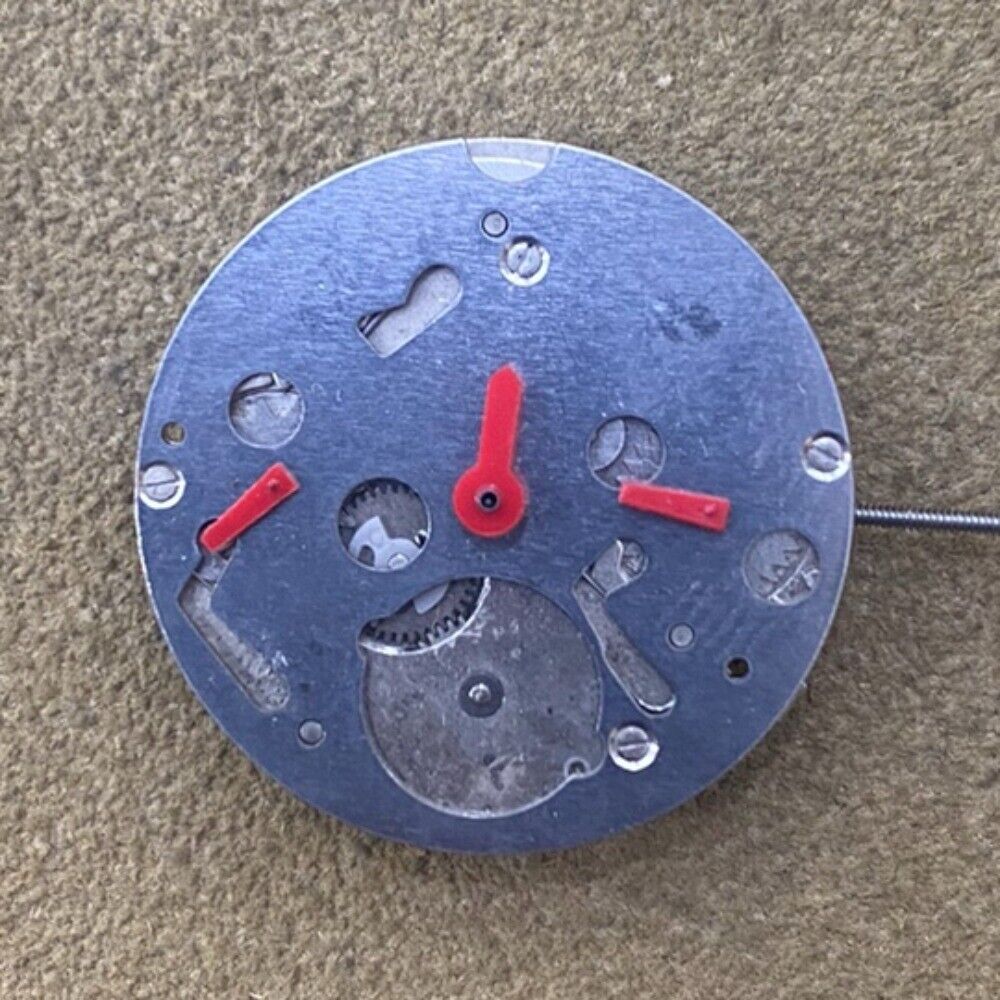 Japan-made Miyota S601 quartz watch movement with small seconds at 3, 6, and 9 o'clock, no calendar.