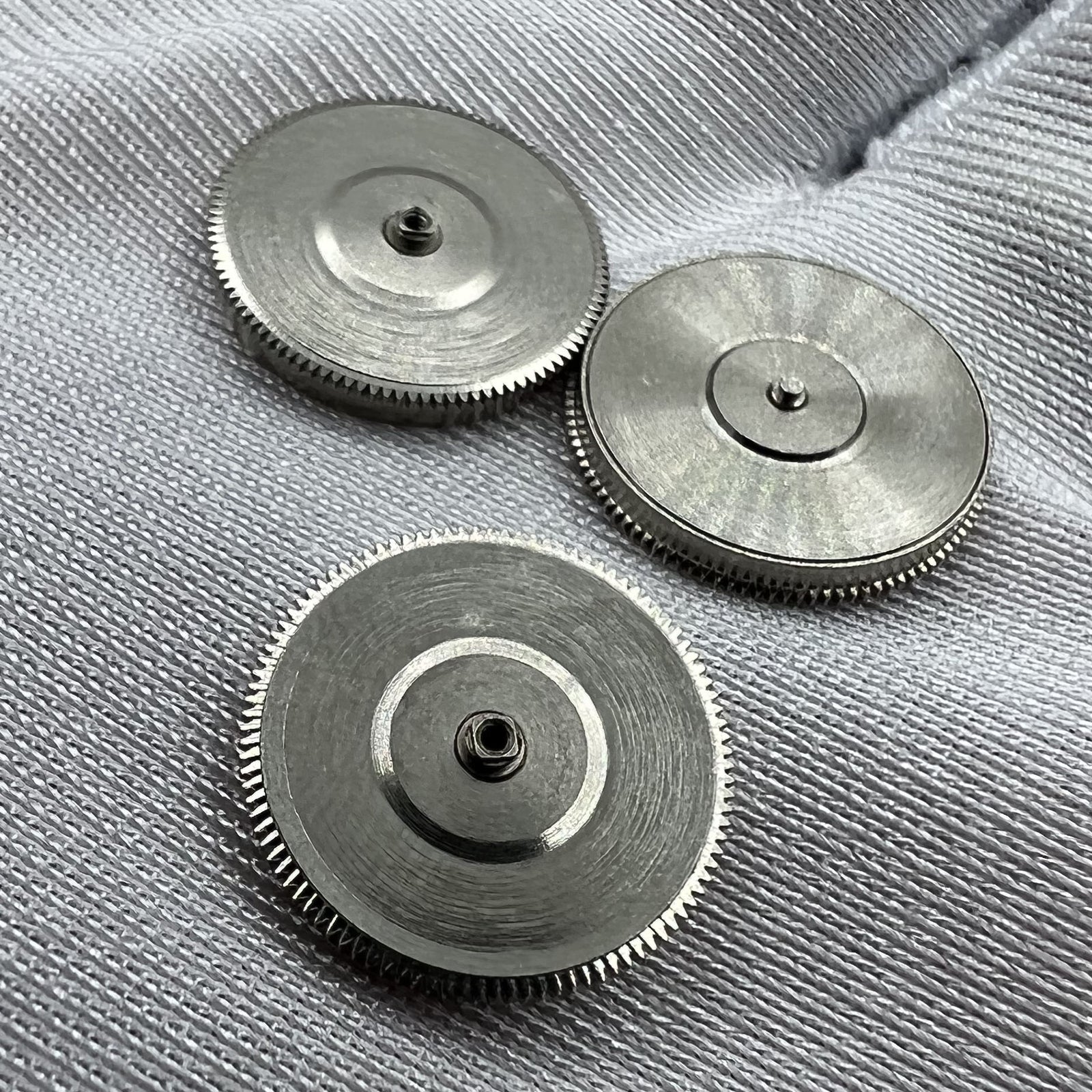 Complete barrel with mainspring for SW200 watch movement, reliable generic replacement part.