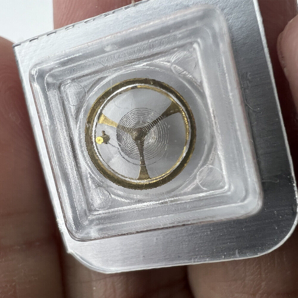 Golden complete balance wheel with hairspring for Orient 46941 46943 watch movement, precise timekeeping part.