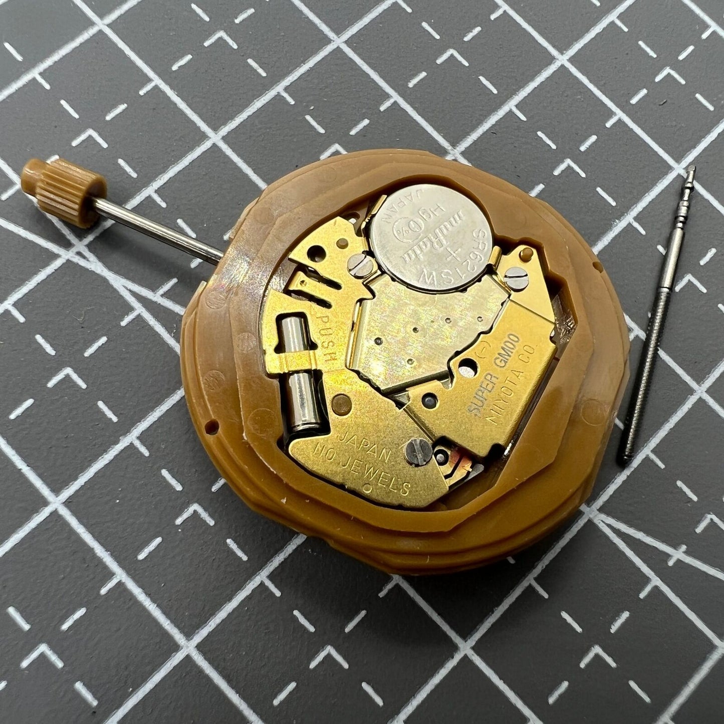 Miyota GM00 Japan quartz watch movement with English and Chinese time characters, reliable precision by Miyota.