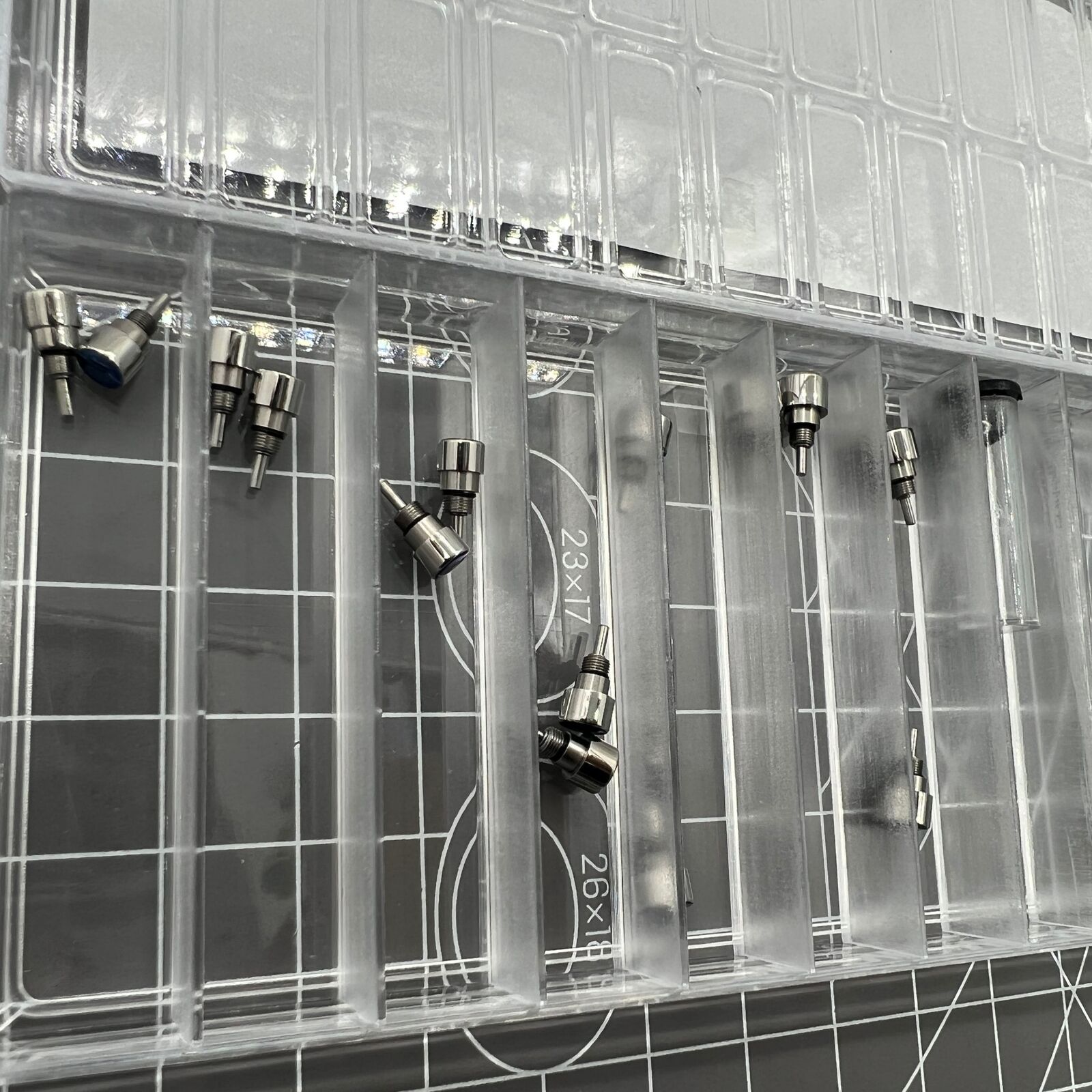 Set of 14 stainless steel watch pushers in 7 sizes, classic silver design for precise watch repair tasks