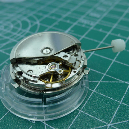 Automatic mechanical watch with week/month indicators, moon phase at 6 o'clock, ideal for collectors.