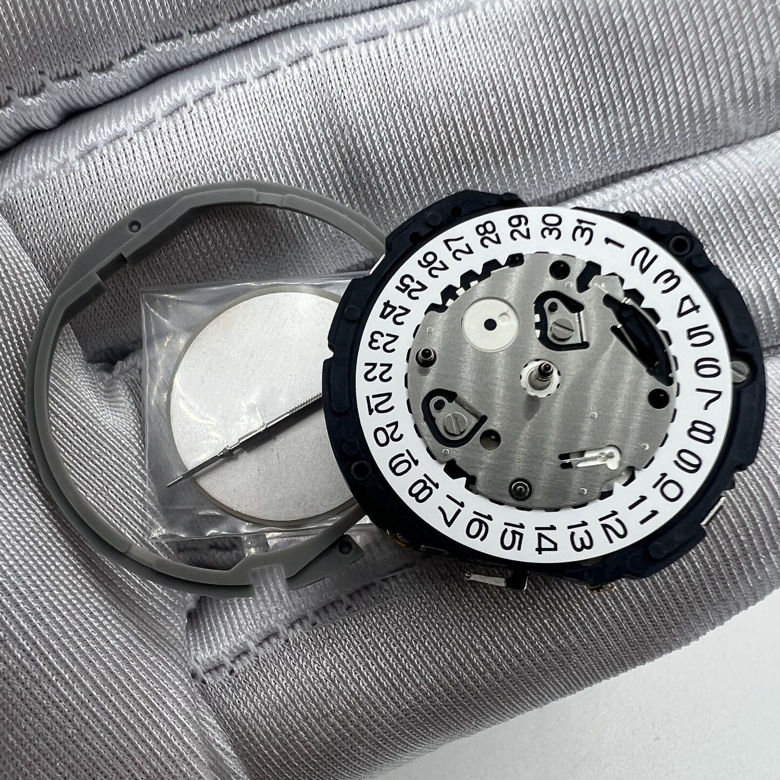 Hattori Epson TMI YM64A quartz watch movement, Japan made for precise timekeeping.