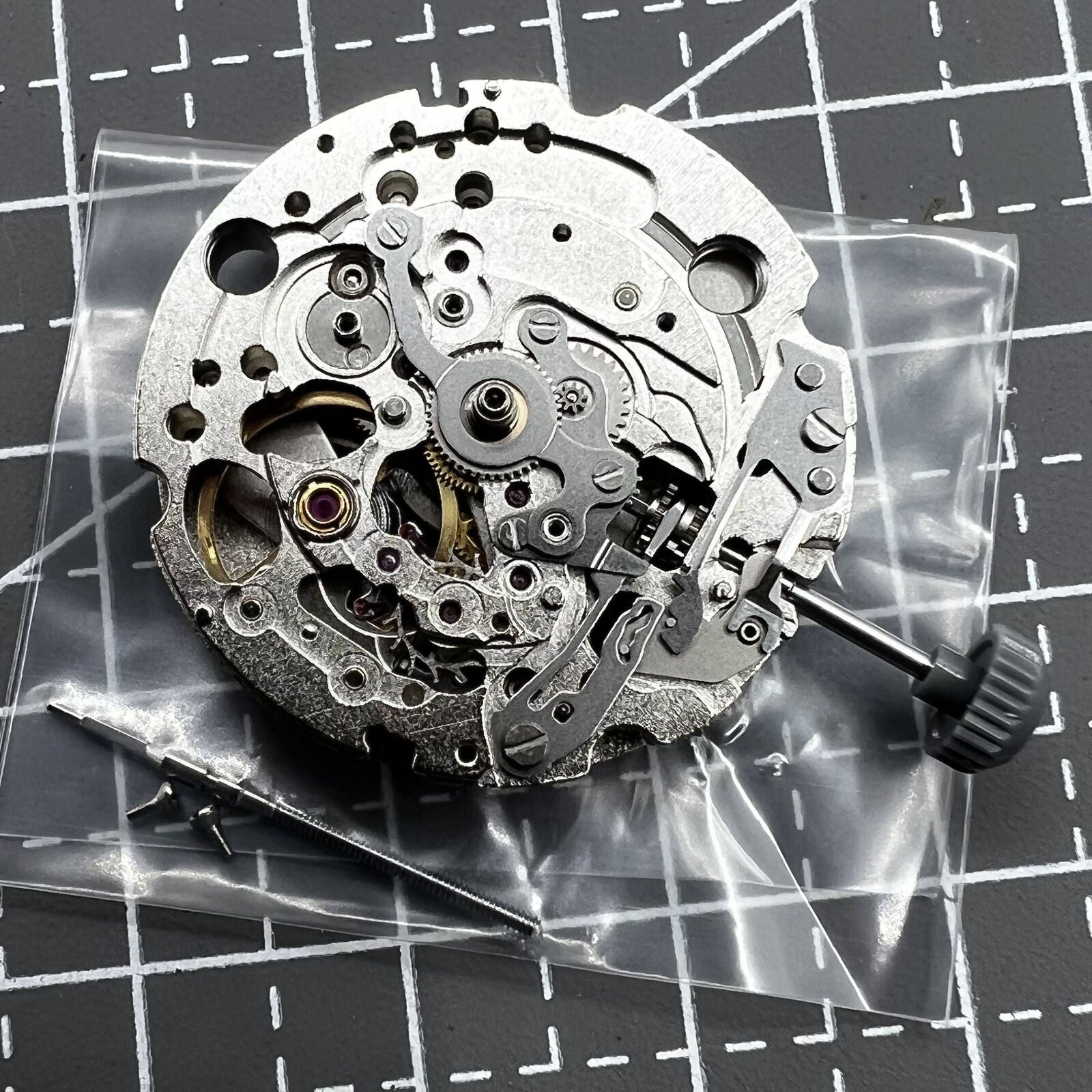 Miyota 82S0 Silver Hollow automatic mechanical movement for precise watch accessories.