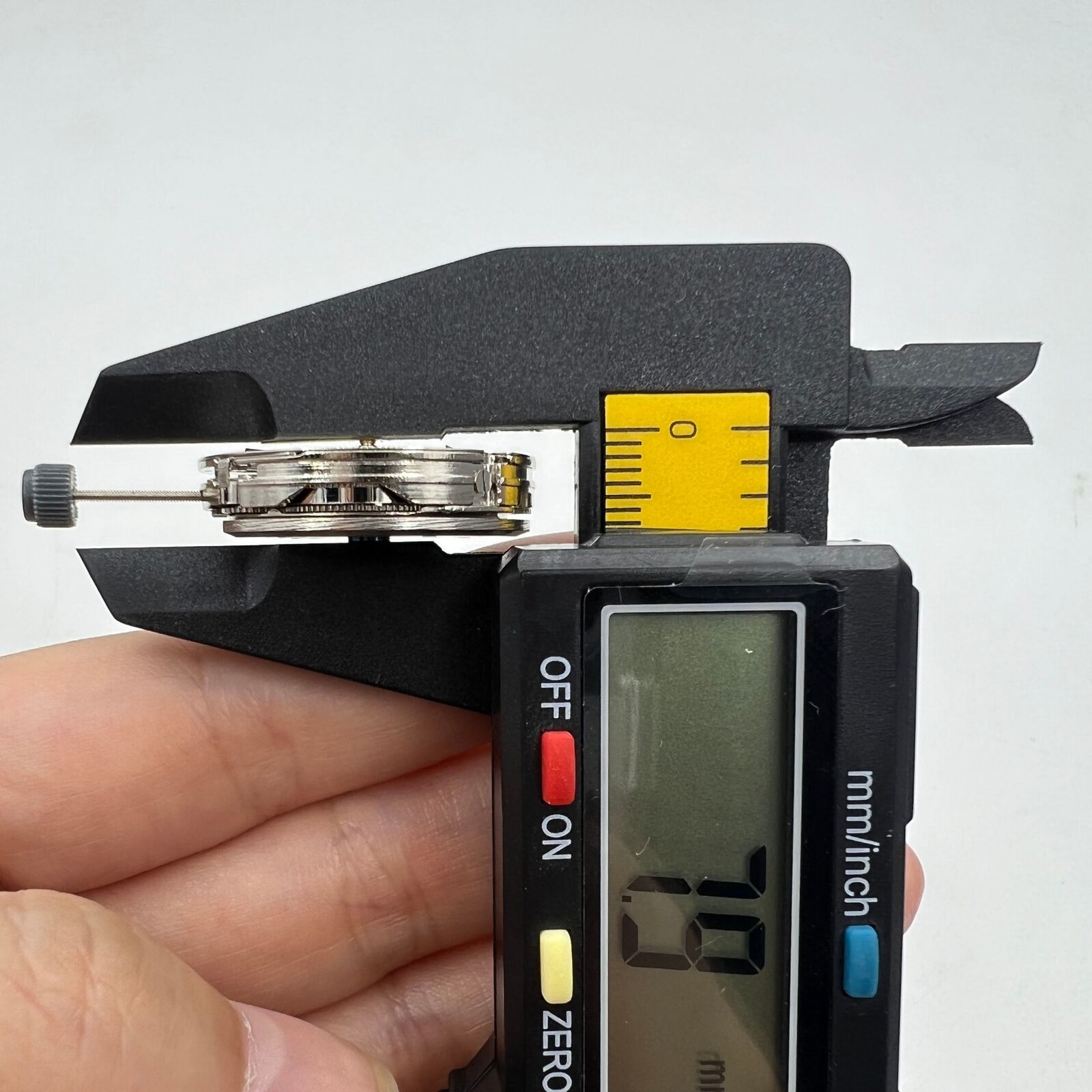 DG2813 automatic watch movement displaying three large hands and small seconds at 6 o'clock, no calendar feature.